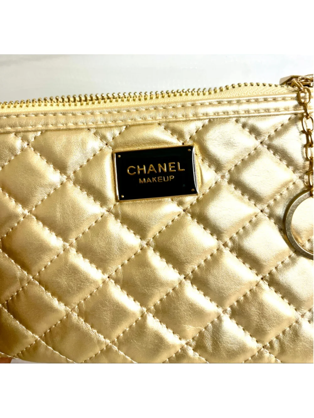 Chanel Makeup quilted gold pouch